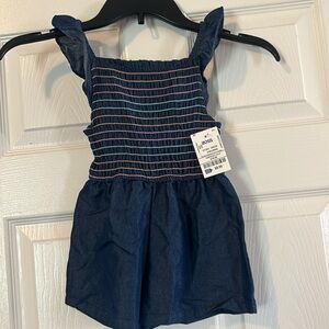 4/$20 Denim colored romper with tags.